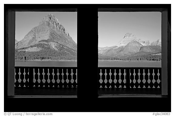 Grinnell Point and Swiftcurrent Lake framed by windows of Many Glacier Lodge. Glacier National Park (black and white)