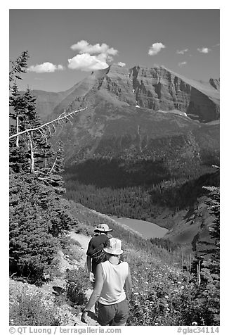 Hiking down the Grinnell Glacier trail, afternoon. Glacier National Park (black and white)