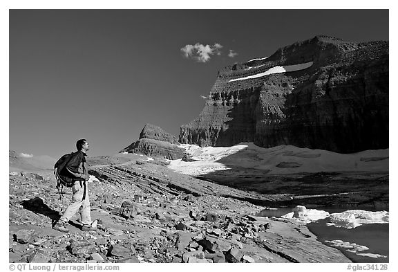 Hiker on moraine near Grinnell Glacier. Glacier National Park (black and white)