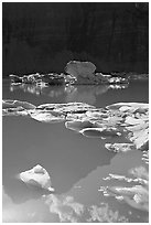 Garden wall reflection and icebergs in Upper Grinnell Lake. Glacier National Park ( black and white)