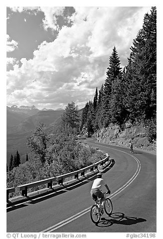 Bicyclists riding down Going-to-the-Sun road. Glacier National Park (black and white)