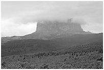 Chief Mountain, with top in the clouds. Glacier National Park ( black and white)