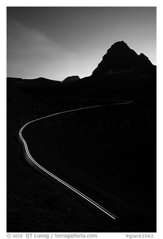 Going-to-the-Sun road at dusk with car light trail. Glacier National Park (black and white)