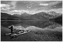 Kayaker readying gear, Kintla Lake. Glacier National Park ( black and white)