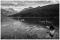Four kayakers on Kintla Lake. Glacier National Park ( black and white)