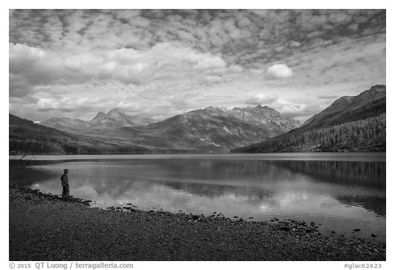 Visitor looking, Kintla Lake. Glacier National Park (black and white)