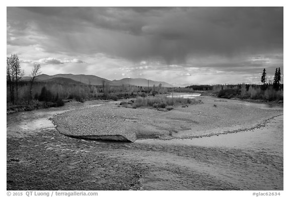 Storm clouds over wide stretch of North Fork of Flathead River. Glacier National Park (black and white)