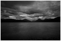 Ominous atmosphere on Lake McDonald at dawn. Glacier National Park ( black and white)