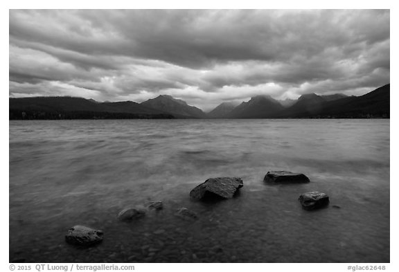 Rain clouds, turbulent waters, and rocks, Lake McDonald. Glacier National Park (black and white)