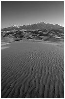 Sand ripples and Sangre de Christo mountains in winter. Great Sand Dunes National Park, Colorado, USA. (black and white)