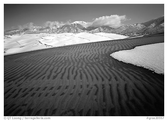 Ripples in partly snow-covered sand dunes. Great Sand Dunes National Park and Preserve (black and white)
