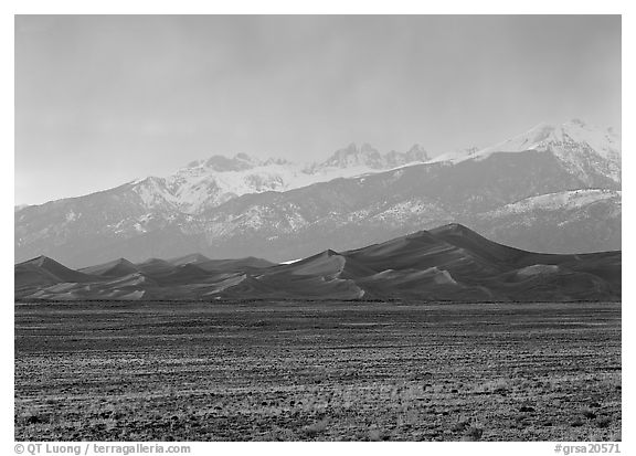 Flats, sand dunes, and snowy Sangre de Christo mountains. Great Sand Dunes National Park and Preserve (black and white)