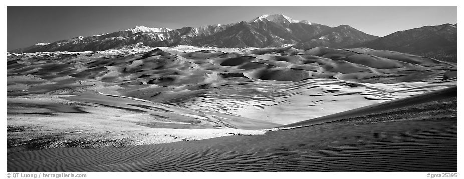 Landscape of sand dunes and mountains in winter. Great Sand Dunes National Park and Preserve (black and white)