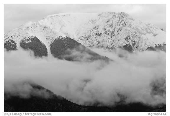 Snowy Sangre de Cristo Mountains above clouds. Great Sand Dunes National Park and Preserve (black and white)