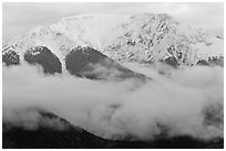 Snowy Sangre de Cristo Mountains above clouds. Great Sand Dunes National Park, Colorado, USA. (black and white)