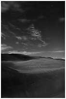 Dunes with starry sky at night. Great Sand Dunes National Park, Colorado, USA. (black and white)