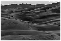 Dune ridges at dusk. Great Sand Dunes National Park, Colorado, USA. (black and white)