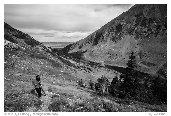 Hiker above Medano Lakes. Great Sand Dunes National Park and Preserve (black and white)