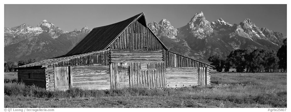 Wooden barn and mountain range. Grand Teton National Park (black and white)
