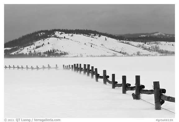 Fence, snowdrift and Ulh Hill. Grand Teton National Park (black and white)
