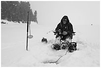 Ice fisherman in white-out, Jackson Lake. Grand Teton National Park ( black and white)