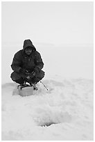 Ice fishing during a snow storm, Jackson Lake. Grand Teton National Park ( black and white)
