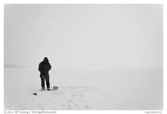 Ice fishing on Jackson Lake. Grand Teton National Park (black and white)
