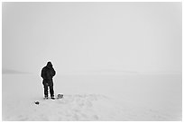 Ice fishing on Jackson Lake. Grand Teton National Park ( black and white)