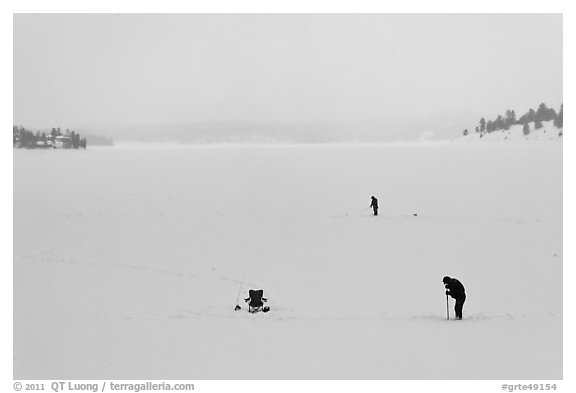 Jackson Lake in winter with ice fishermen. Grand Teton National Park (black and white)