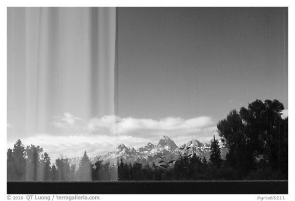 Teton Range, Craig Thomas Discovery and Visitor Center window reflexion. Grand Teton National Park (black and white)