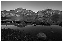 Teton Range reflected in Jenny Lake at sunrise. Grand Teton National Park ( black and white)