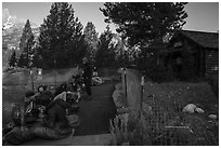 Hikers and climbers camped out in front of Jenny Lake Ranger Station for permits. Grand Teton National Park ( black and white)