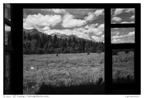 Tetons seen from inside Laurence S. Rockefeller Preserve visitor center. Grand Teton National Park (black and white)