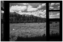 Tetons seen from inside Laurence S. Rockefeller Preserve visitor center. Grand Teton National Park ( black and white)