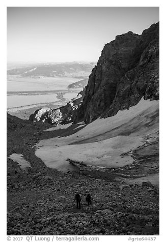 Mountaineers hiking down rocky slope, Garnet Canyon. Grand Teton National Park (black and white)