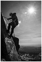 Woman climber rappelling on Grand Teton. Grand Teton National Park ( black and white)