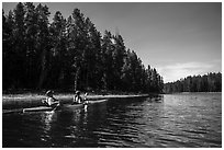 Kayakers in forested inlet, Colter Bay. Grand Teton National Park ( black and white)