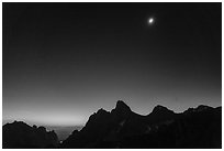 Solar eclipse above the Tetons, begining of totality. Grand Teton National Park ( black and white)