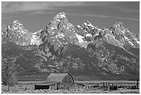 Moulton Barn and Grand Tetons, morning. Grand Teton National Park, Wyoming, USA. (black and white)