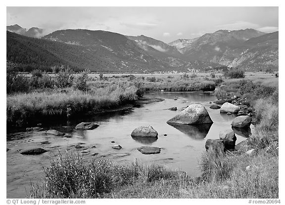 Creek, boulders, and meadow surrounded by mountains, autum. Rocky Mountain National Park (black and white)