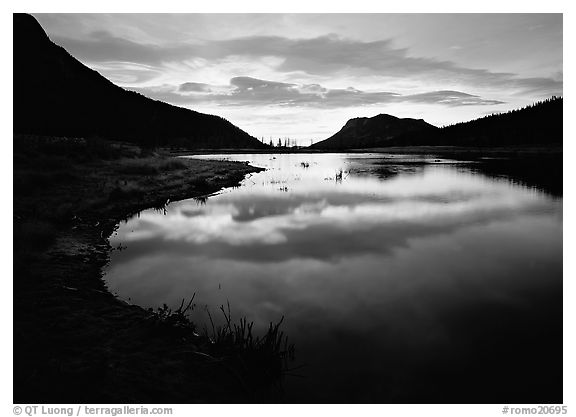 Pond with cloud reflexion at sunrise, Horsehoe Park. Rocky Mountain National Park (black and white)