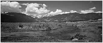 Mountain scenery with green meadows and stream. Rocky Mountain National Park (Panoramic black and white)
