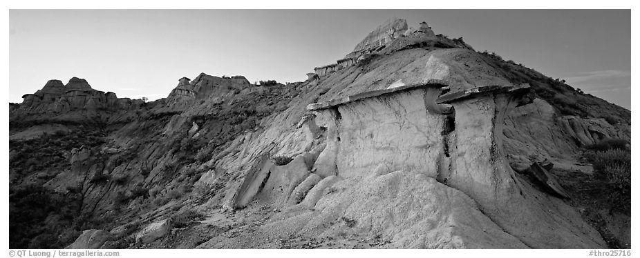 Badlands scenery with caprocks. Theodore Roosevelt National Park (black and white)