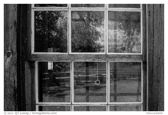 Badlands reflected in Maltese Cross cabin window. Theodore Roosevelt National Park (black and white)