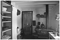 Kitchen of Roosevelt's Maltese Cross Cabin. Theodore Roosevelt National Park ( black and white)