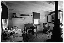 Dining room of Theodore Roosevelt's Maltese Cross Cabin. Theodore Roosevelt National Park ( black and white)