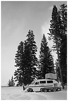 Snowcoach and trees. Yellowstone National Park, Wyoming, USA. (black and white)