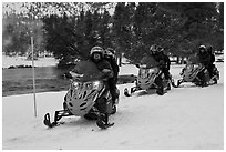Snowmobile riders. Yellowstone National Park, Wyoming, USA. (black and white)