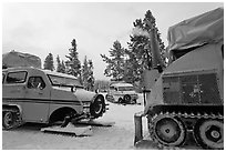 Bombardier snowcoaches. Yellowstone National Park ( black and white)