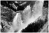 Mist raising from falls of the Yellowstone river. Yellowstone National Park, Wyoming, USA. (black and white)